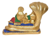 Side view: brass Lakshmi-Vishnu idol on Sheshnag, blue base border, green accents