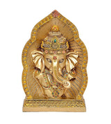 Resin Lord Ganesha idol close-up, gold finish with jeweled details, front