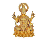 Brass Lakshmi statue front view, circular halo, four raised hands, detailed lotus base