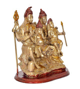 Brass Shiv Parivar statue side angle with four figures, tridents, and ornate detailing