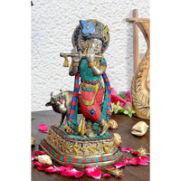 Brass Krishna statue with cow, painted blue turban and red dhoti, 9.6 in