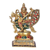 Brass Saraswati idol with painted green, red, and gold swan base, seated pose