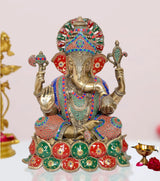 Brass Lord Ganesha grand sculpture with colorful enamel attire and raised trunk