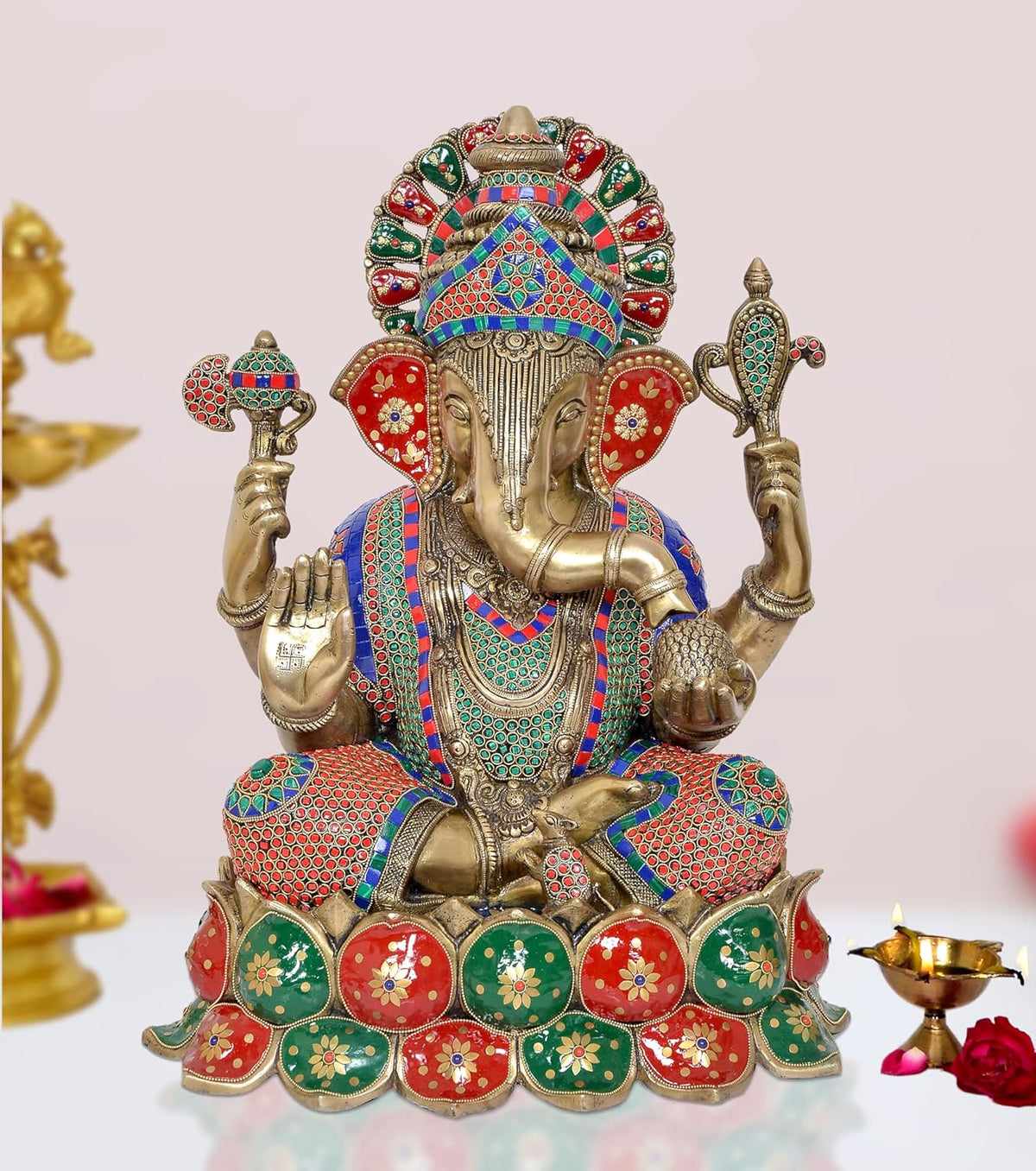 Brass Lord Ganesha grand sculpture with colorful enamel attire and raised trunk