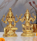 Brass Lakshmi and Ganesha statue set, both seated with raised hands and detailed crowns