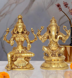 Brass Lakshmi and Ganesha statue set, both seated with raised hands and detailed crowns
