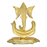 Gold metal Ganesha idol statue front view, carved pedestal base with border