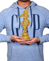 Brass Krishna idol on palm, playing flute figure held by hands for size