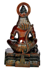 Back view of bronze-toned Hanuman yoga pose idol statue with arched halo, seated on base