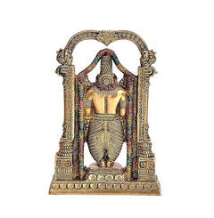 Brass Venkateswara idol front view, layered ornaments and colorful accents inside arch