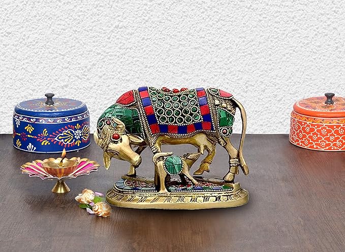 Brass Kamdhenu-style cow and calf idol with jeweled saddle and head details