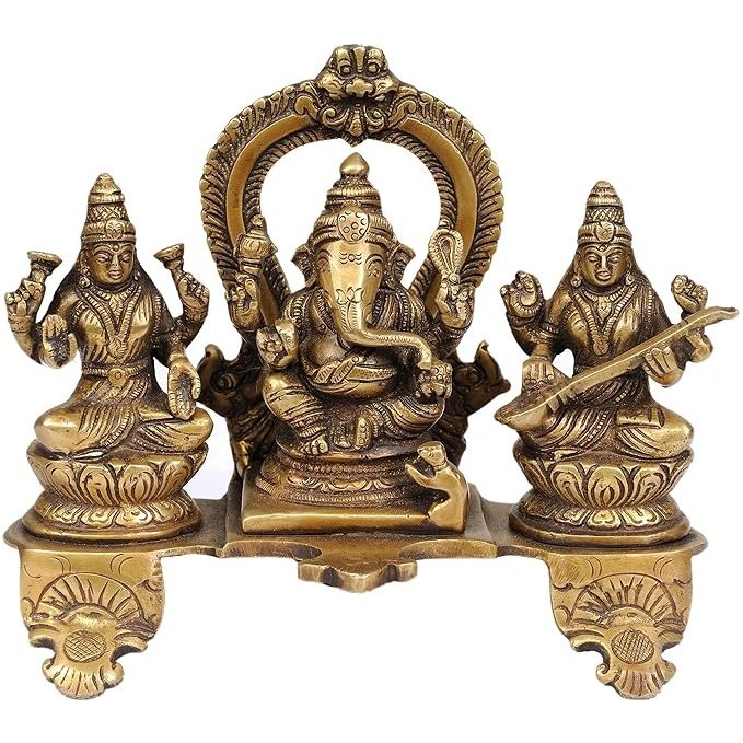 Brass triple deity idol: Lakshmi, Ganesha and Saraswati seated on lotus base