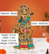 AONA Brass Krishna flute idol on cow base, multicolor inlaid details; 13 inch height
