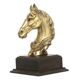Gold-tone horse head sculpture on dark wooden base, angled view