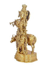 Brass standing Krishna with cow statue, side view showing cow and raised shield