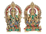 Two brass Lakshmi and Ganesh idols side-by-side, intricate painted detailing and crown