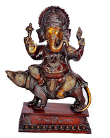 Ganesha brass figurine seated on mouse on rectangular maroon base