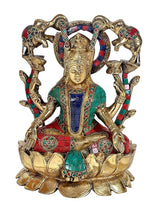 Brass Lakshmi sitting on lotus with multicolour jewel trim; elephants encircle her