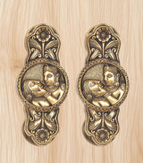 Brass door handles pair with detailed god-and-goddess oval medallions and floral motifs