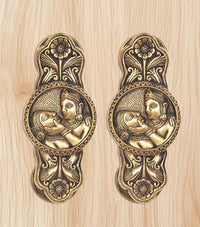 Brass door handles pair with detailed god-and-goddess oval medallions and floral motifs