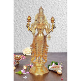 Brass Lakshmi statue, standing four-armed pose, 12.5 in tall