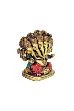 Panchmukhi Ganesha resin idol angled view, five gold faces, red and green attire