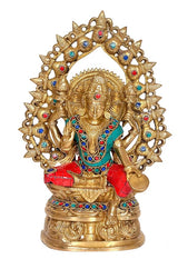 Brass Lakshmi figurine with beaded circular frame and jeweled details on base