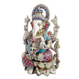 Sitting Ganesha brass figure, turquoise and red jeweled dhoti, four hands raised