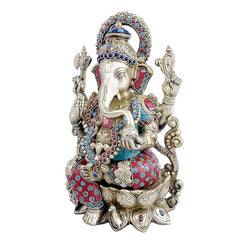 Sitting Ganesha brass figure, turquoise and red jeweled dhoti, four hands raised