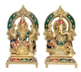 Brass Lakshmi and Ganesha deity idol set with colorful outfits and green halo details
