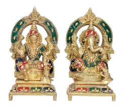 Brass Lakshmi and Ganesha deity idol set with colorful outfits and green halo details