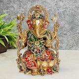 Brass Ganpati on lotus base, 12 in, front view, gold tone with blue red green patterns