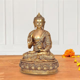 Brass Buddha figurine, seated mudra, ornate robe and patterned base