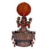 Brass sun chariot statue back view with large sun disk and ornate base, brown.