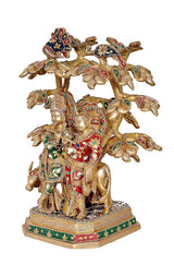Radha-Krishna idol with cow and spreading tree branches, rich multicolor detailing