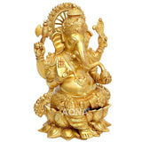 Brass Mangalkari Ganesha statue, side view with arch headdress and detailed jewelry
