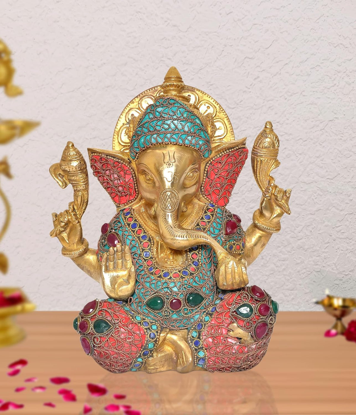 AONA gold Ganesha idol statue, turquoise crown and red gemstone-studded robe