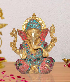 AONA gold Ganesha idol statue, turquoise crown and red gemstone-studded robe
