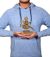 Brass Saraswati idol held in hands, veena and swan figure visible, colorful painted details.