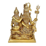 Brass Shankar statue detail with raised trident and seated Parvati, Ganesha, Nandi