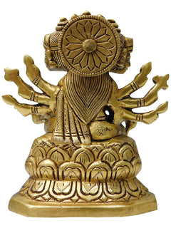 Brass Gayatri Mata statue back view; circular halo motif and draped garment folds