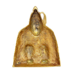 Brass Tulja Bhavani idol, rear view with textured base and worn patina finish