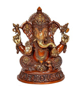 Brass Ganesha statue front view, four arms raised, ornate headdress and jewelry
