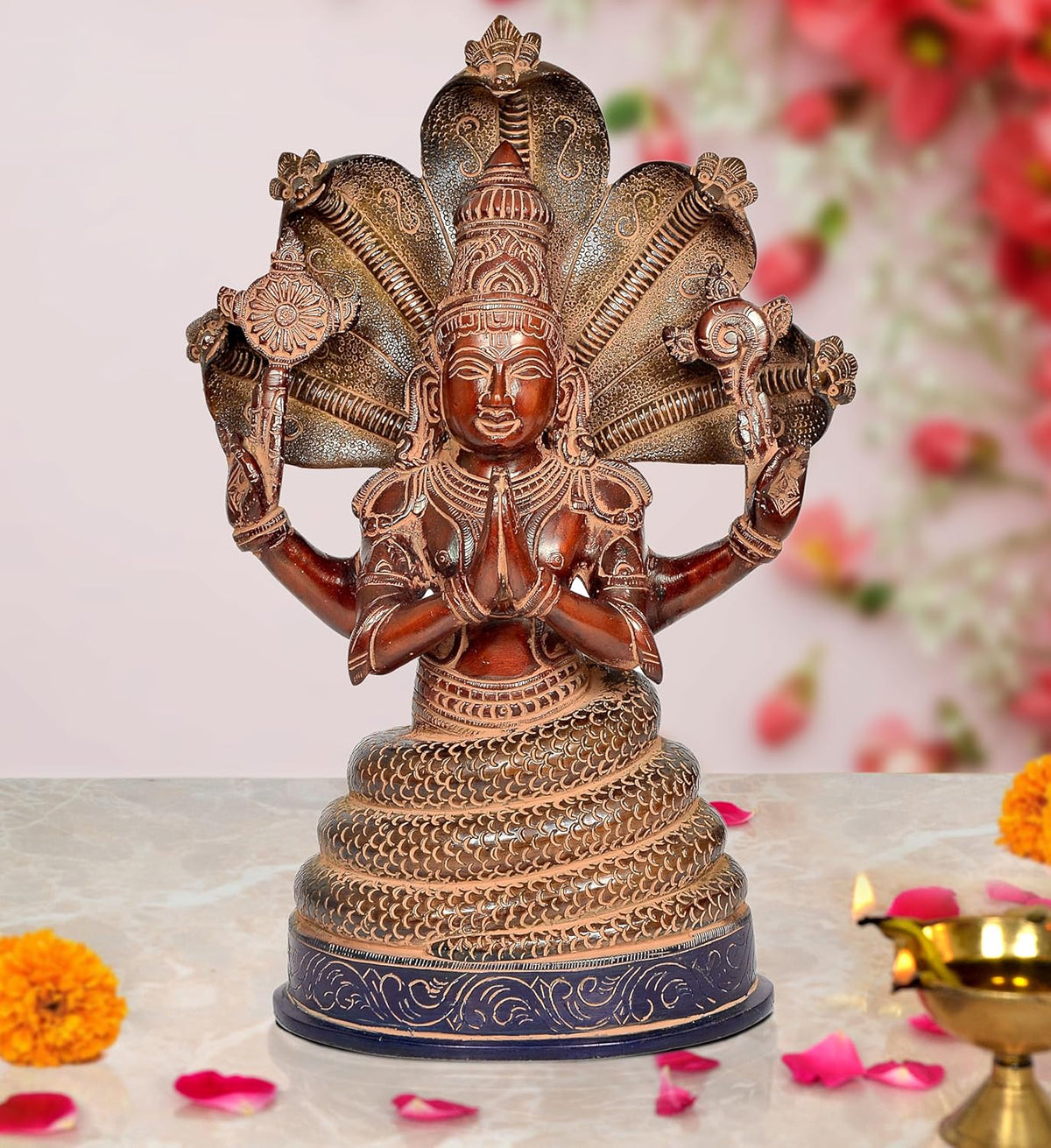 Bronze Patanjali statue with multi-armed cobra canopy, seated in meditative pose