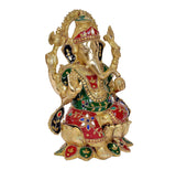 Brass Ganesha idol on lotus, 12 in, side profile with red, green and gold ornaments