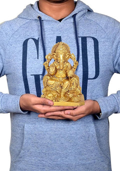 Brass Ganesha idol statue in hand, seated on base, 6 in home decor