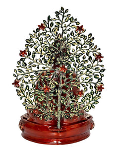 Front view Buddha tree showpiece with red base, golden figure and green leaf branches