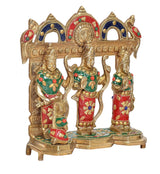 Ram Darbar brass statue, three figures under arch with red, green and blue accents