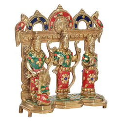 Ram Darbar brass statue, three figures under arch with red, green and blue accents