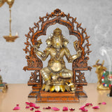 Brass Lord Ganesha idol, seated with ornate arch backdrop, 15.5 in height